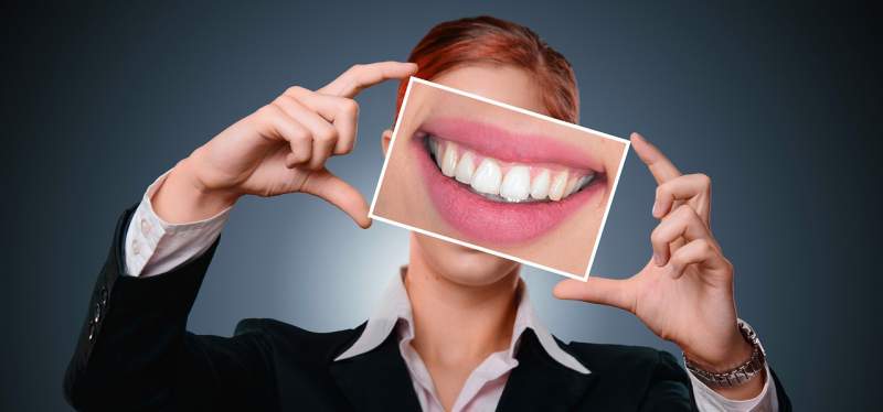 woman-smile-tooth-health-mouth